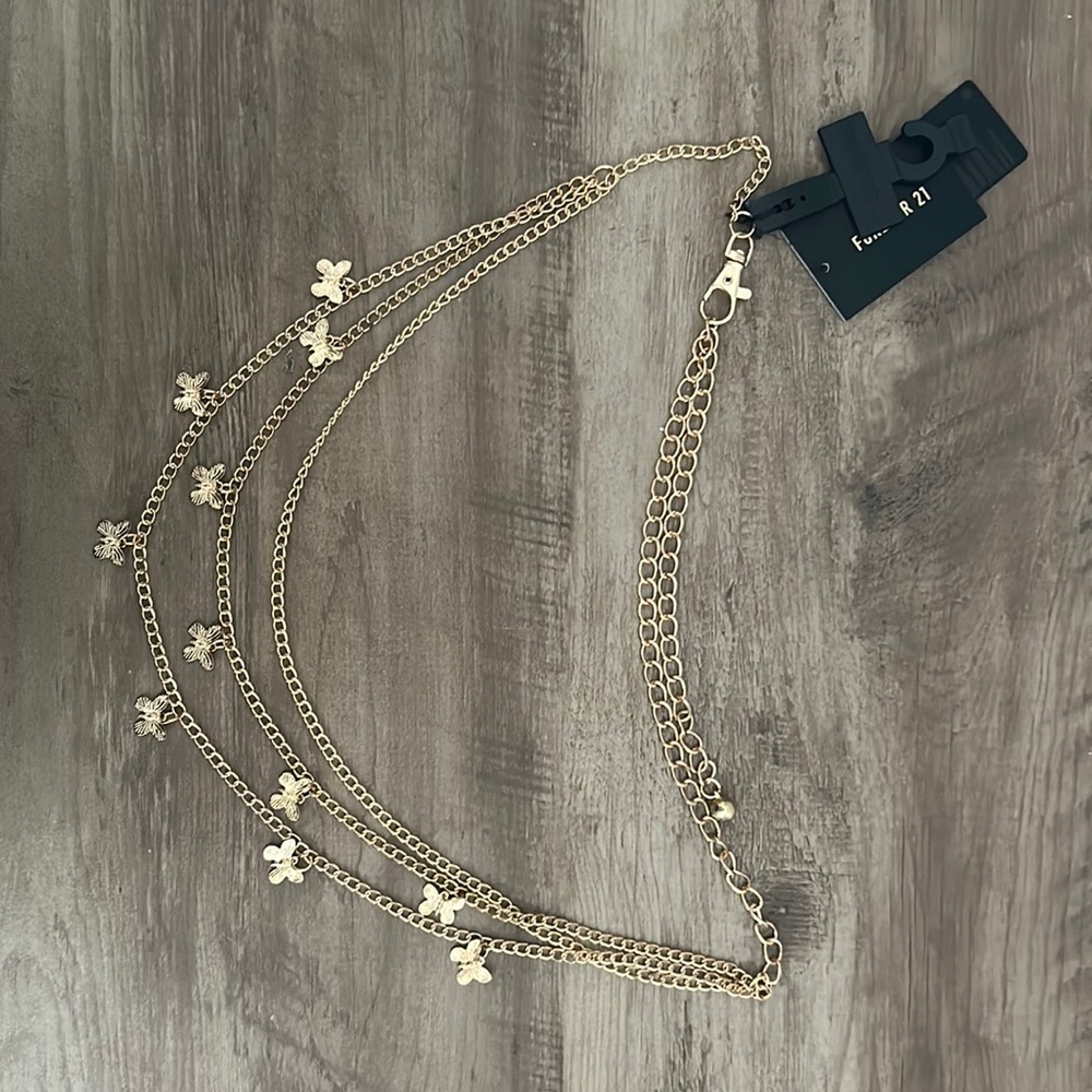 Gold butterflies belt.  Never used.